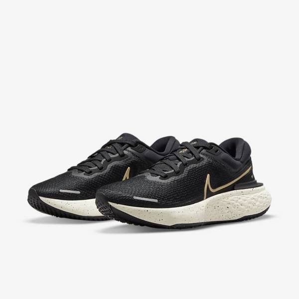 Zapatillas Running Nike ZoomX Invincible Run Flyknit Carretera Mujer Negras Metal Doradas | NK506ULE